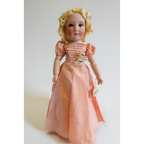 27 - A Unis Jumeau princess doll, 1938, with blue glass sideways glancing eyes, metal sleeping eyelids, c... 