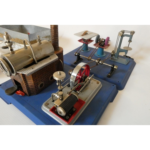 302 - Wilesco D10 steam engine with three workshop machine tools and a quantity of fuel tablets and access... 