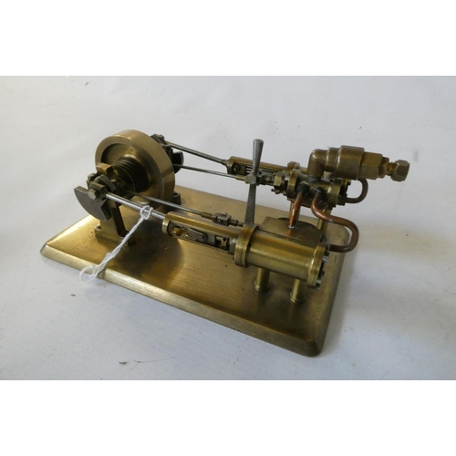 318 - A twin cylinder horizontal steam engine built from brass fabrication, fitted with reversing valve on... 