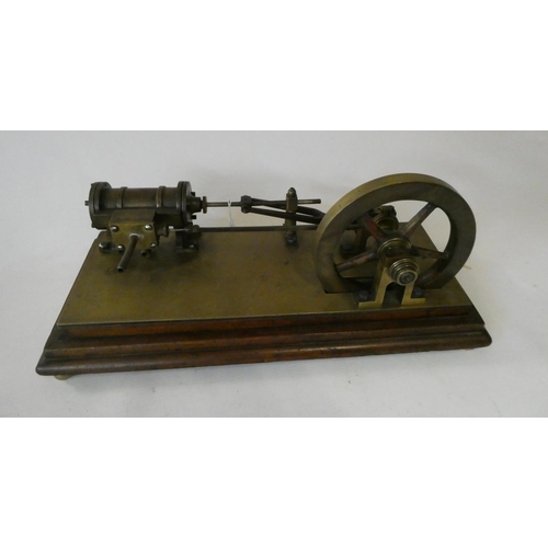 322 - Mid 19th century stationary horizontal non reversing steam engine of brass and steel construction on... 