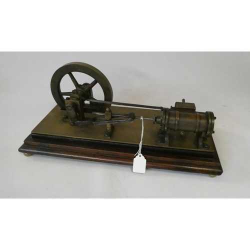 322 - Mid 19th century stationary horizontal non reversing steam engine of brass and steel construction on... 