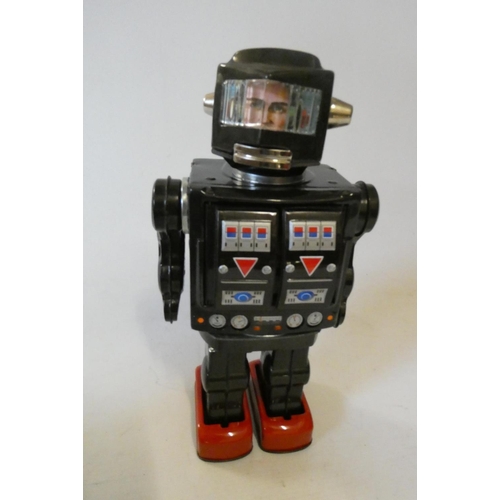 386 - Horikawa Rotomatic Super Astronaut of tinplate and plastic construction, no response when battery is... 