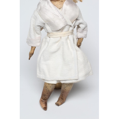 46 - A French bisque swivel neck shoulder head fashion doll, possibly Jumeau, with blue glass fixed eyes,... 