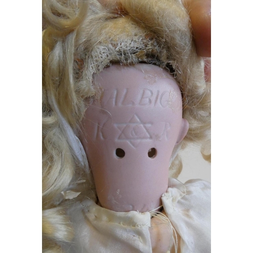 47 - A Kammer & Reinhardt bisque socket head doll with blue glass sleeping eyes, open mouth, teeth, pierc... 