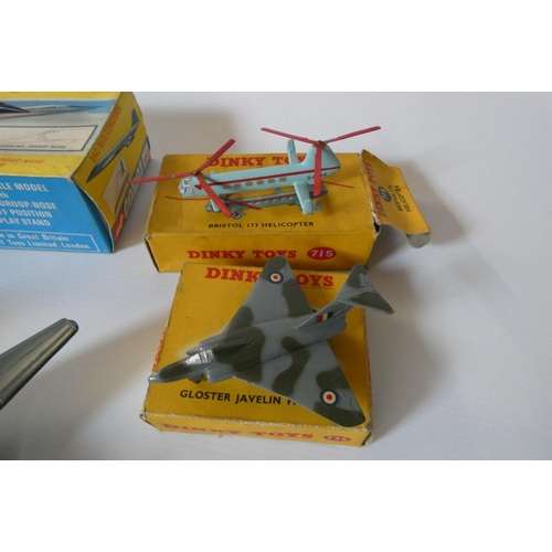 508 - Five Dinky Aircraft models comprising 719 Spitfire (box poor), 715 Bristol 173 Helicopter (box fair)... 