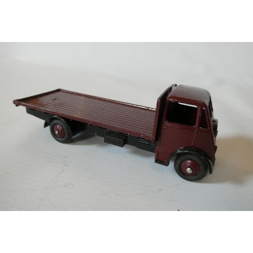 515 - Dinky Super Toys 512 guy flat truck in maroon, boxed, fair to good (Est. plus 24% premium inc. VAT)