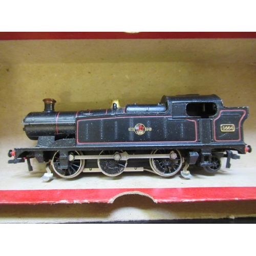 528 - Trix Twin BR (GWR) 0-6-2 tank locomotive and two BR Western Region Brown/cream coaches, fair to good... 