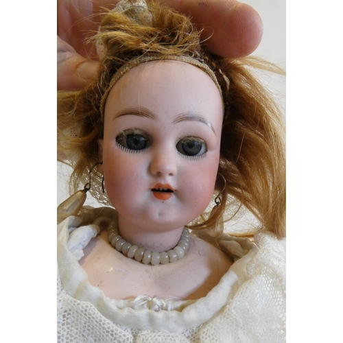 53 - A Simon & Halbig socket head doll with blue glass sleeping eyes, open mouth, teeth, pierced ears, bl... 