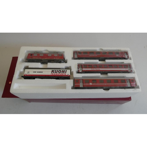 543 - Bemo H0e Glacier Express train set with locomotive, three coaches and wagon, boxed, good (Est. plus ... 