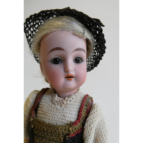 69 - A Kammer & Reinhardt Halbig bisque socket head doll, with brown glass sleeping eyes, open mouth, tee... 