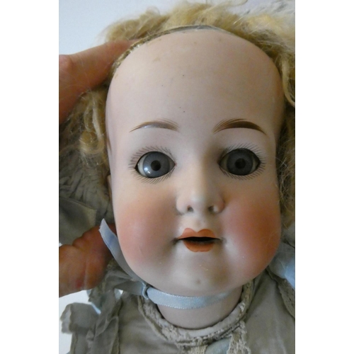 77 - Two German bisque socket head dolls, comprising a 24