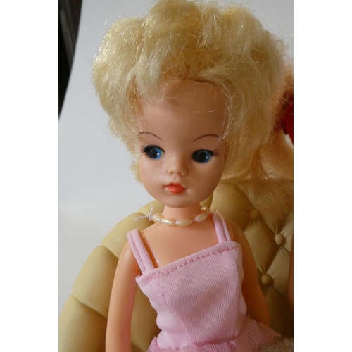 80 - Two Sindy dolls, accessories and clothing, one marked 033055X and the other marked 2 GEN 1077 033055... 