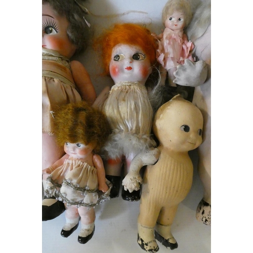 85 - Seven Kewpie type composition dolls, all with jointed shoulders, largest 11