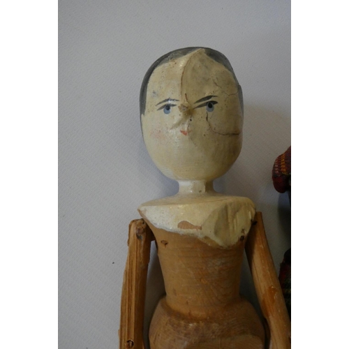 86 - Five wooden peg dolls, comprising one 11 3/4