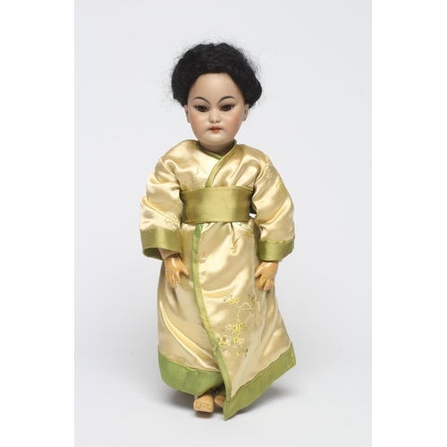 87 - A Simon & Halbig bisque socket head Asian girl doll, with brown glass sleeping eyes, open mouth, tee... 