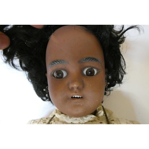 88 - A Simon & Halbig bisque socket head girl doll, with brown glass sleeping eyes, open mouth, teeth, pi... 