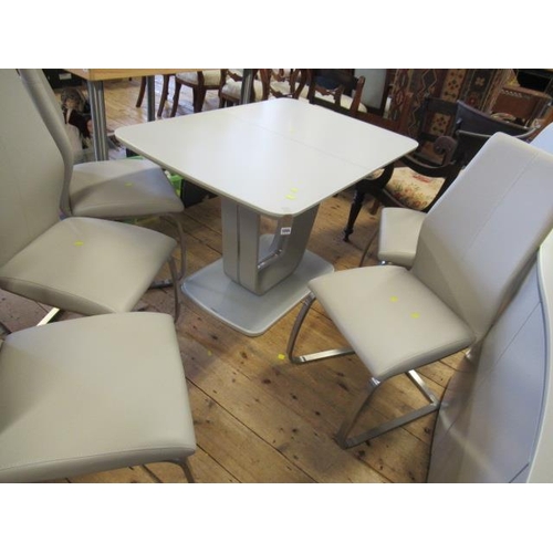 1055 - MODERN EXTENDING DINING TABLE AND SIX CHAIRS