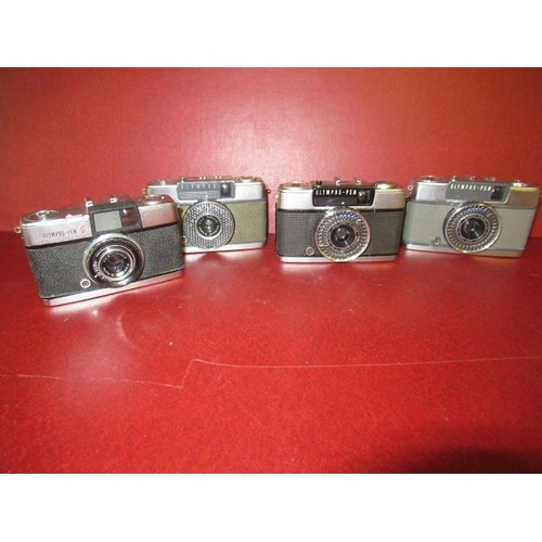 427 - FOUR OLYMPUS PEN HALF FRAME 35M CLASSIC CAMERAS