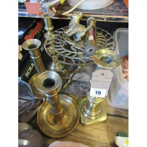 19 - BRASS TRIVET AND BRASS CANDLESTICKS ETC