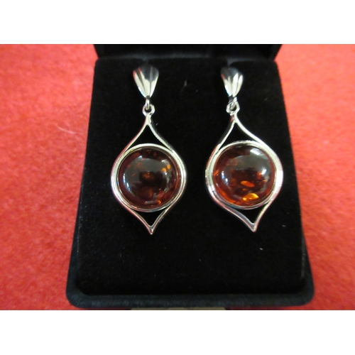 165 - PAIR OF AMBER AND SILVER EARRINGS