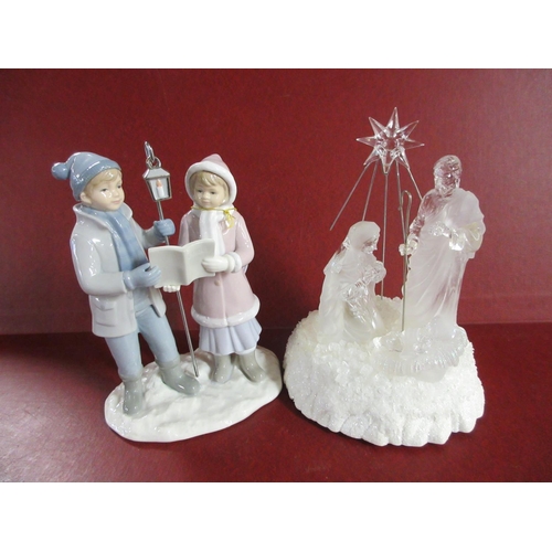 242 - PORCELAIN BOY AND GIRL CHRISTMAS ORNAMENT WITH LIGHT UP MANGER SCENE