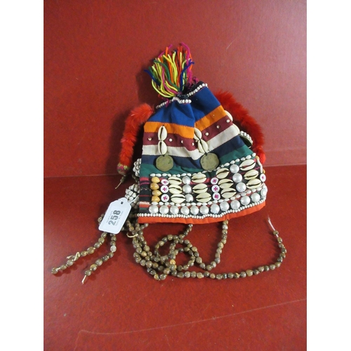 258 - TRIBAL (?) HAT WITH SHELLS