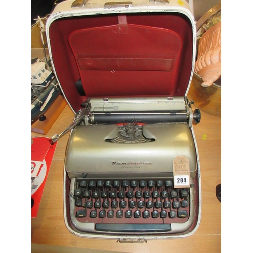 284 - VINTAGE CASED REMINGTON TYPEWRITER