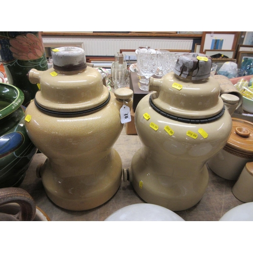 92 - PAIR OF LARGE STONEWARE GRIFFIN 
 GAS GENERATOR JARS