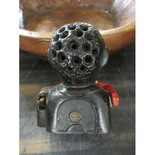 262 - CAST IRON MONEY BOX AND A COW HORN