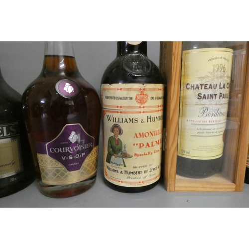 12 - Twelve bottles of mixed alcohol and cognac, comprising a 680ml Courvoisier Luxe cognac, a 70cl Rayna... 