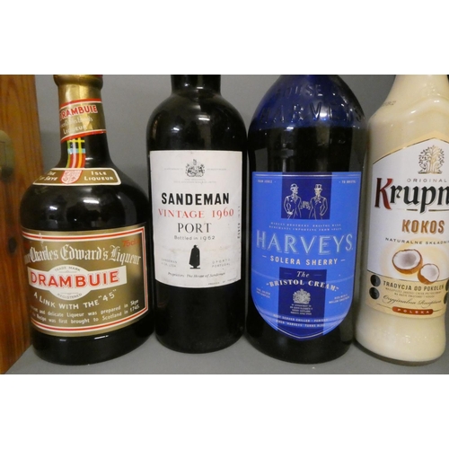 12 - Twelve bottles of mixed alcohol and cognac, comprising a 680ml Courvoisier Luxe cognac, a 70cl Rayna... 