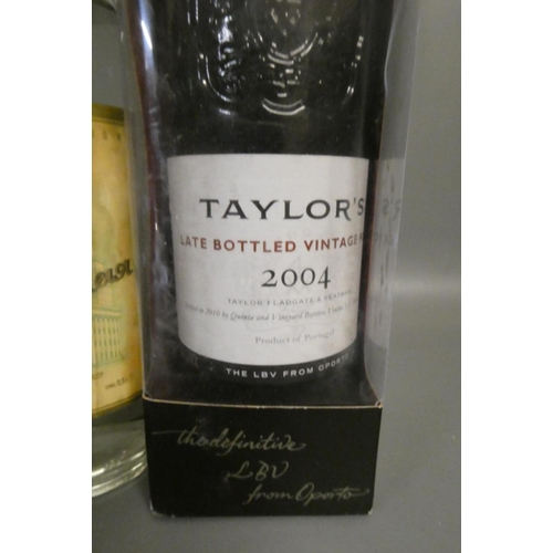 13 - Four bottles of mixed alcohol, comprising a boxed Taylor's 2004 LBV port, a bottle of USSR vodka, a ... 