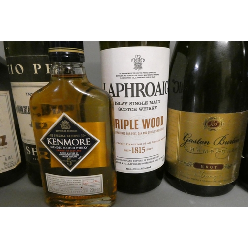 18 - Ten and four half bottles of mixed alcohol, including Laphroaig triple wood whisky, Dow's 1994 vinta... 