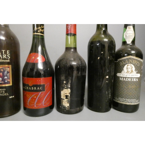 20 - Eight bottles of alcohol, comprising a vintage bottle Laroque bordeaux, a Domaines Meffre, two Hanov... 