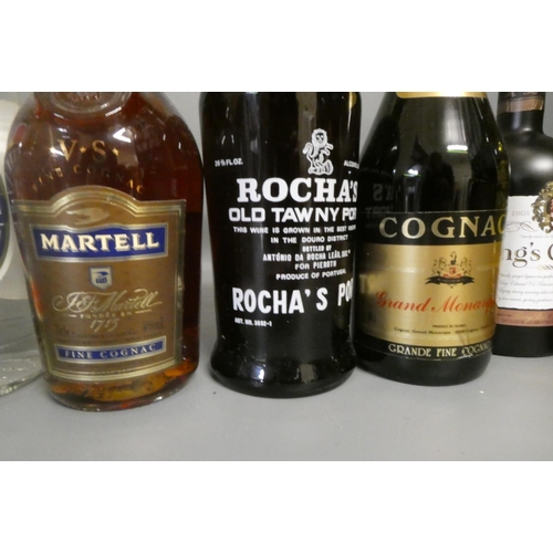 29 - Twelve bottles of mixed liqueur and spirits, comprising a Martell fine cognac, a Grand Monarque cogn... 