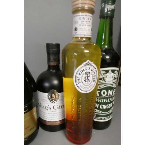 29 - Twelve bottles of mixed liqueur and spirits, comprising a Martell fine cognac, a Grand Monarque cogn... 