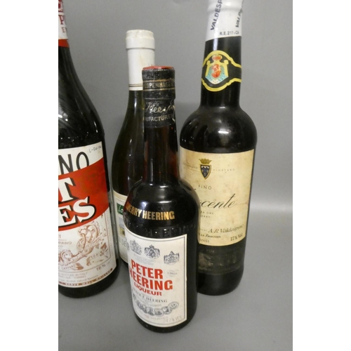 30 - Twenty seven bottles of mixed alcohol, including five Martini vermouth, one Martini vermouth rose, a... 