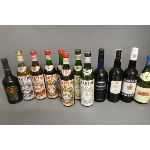 30 - Twenty seven bottles of mixed alcohol, including five Martini vermouth, one Martini vermouth rose, a... 