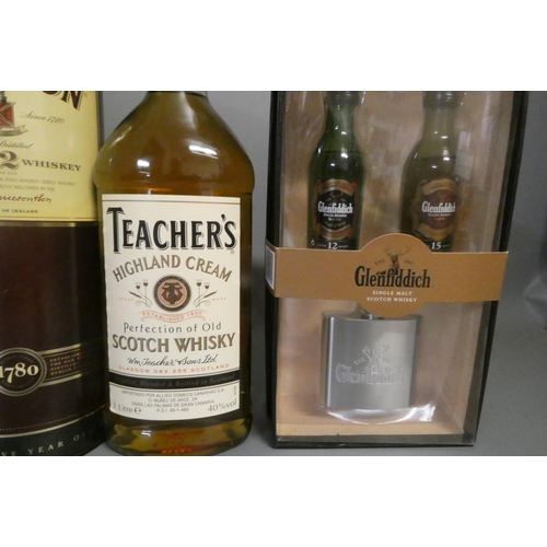 35 - Five bottles of mixed spirits & Liqueur, comprising a boxed Jameson 12yr old whiskey, a Teacher's Hi... 