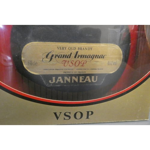 58 - Two presentation boxes, one with a 68cl bottle Janneau VSOP Grand Armangnac with two glasses and the... 