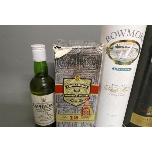 74 - Six bottles of Scotch whisky, comprising a 70cl Bowmore Legend in tube, a 70cl Glenfiddich 12yr old ... 