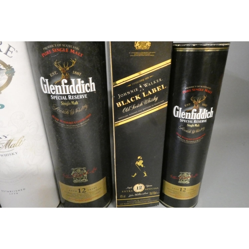 74 - Six bottles of Scotch whisky, comprising a 70cl Bowmore Legend in tube, a 70cl Glenfiddich 12yr old ... 