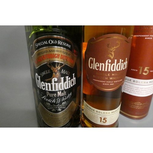 79 - Two bottles of Glenfiddich malt scotch whisky, comprising 1litre pure malt and 70cl 15yr old Unique ... 