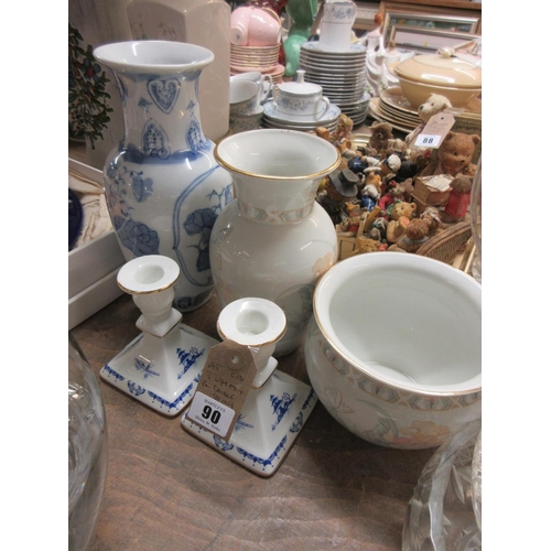 90 - THREE VASES AND A PAIR OF CERAMIC CANDLESTICKS