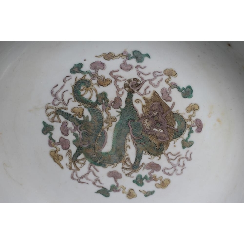 1 - A CHINESE PORCELAIN FAMILLE VERTE BOWL of plain circular form painted with a seated Hotei with seven... 