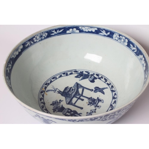 13 - A CHINESE PORCELAIN LARGE BOWL of plain circular form, painted in underglaze blue with two quatrefoi... 