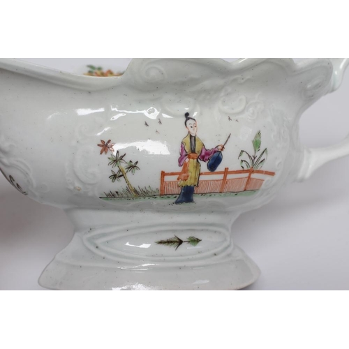 33 - A WORCESTER PORCELAIN HIGH-FOOTED SAUCEBOAT, c.1755, of shaped oval form with moulded panels, painte... 