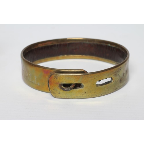 413 - A BRASS DOG COLLAR, early 19th century, engraved 'T R Clapham, Austwick Hall', leather lined, 4 1/2