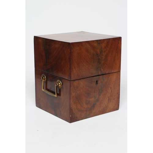 414 - A REGENCY MAHOGANY DECANTER BOX of plain square section, with lacquered brass handles, the cover hin... 