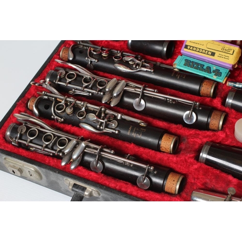 418 - A PAIR OF BOOSEY & HAWKES EMPEROR B? CLARINETS, polished wood with bakelite (?) bells, serial number... 